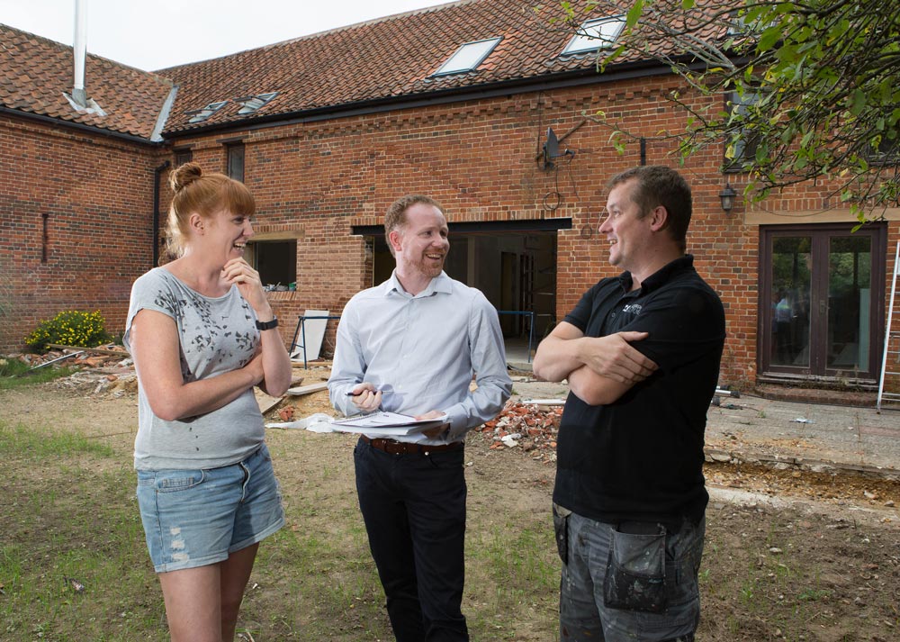 Picture of Lee Marsh with clients on site at Owls Barn, Reedham.
